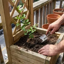 Bac à fleurs en bois avec treillis 40x31x140cm* Online